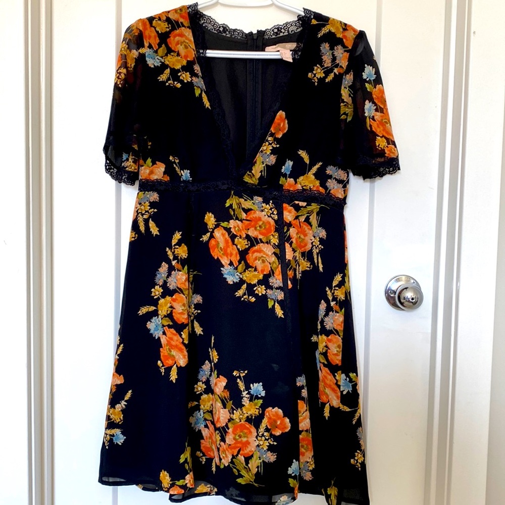 Forever 21 black chiffon dress,big V neck midi length with short sleeve length.